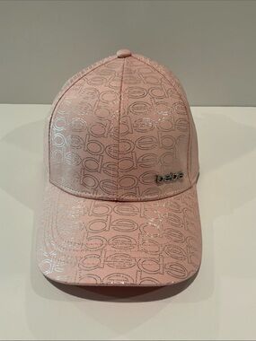 BeBe Cap with adjustable back and Bebe jeweled encrusted on front.